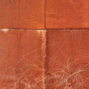 Red rust with swirling lines
